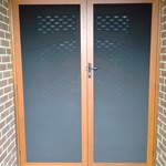 clear-breeze-privacy-wood-grain-double-doors.jpg